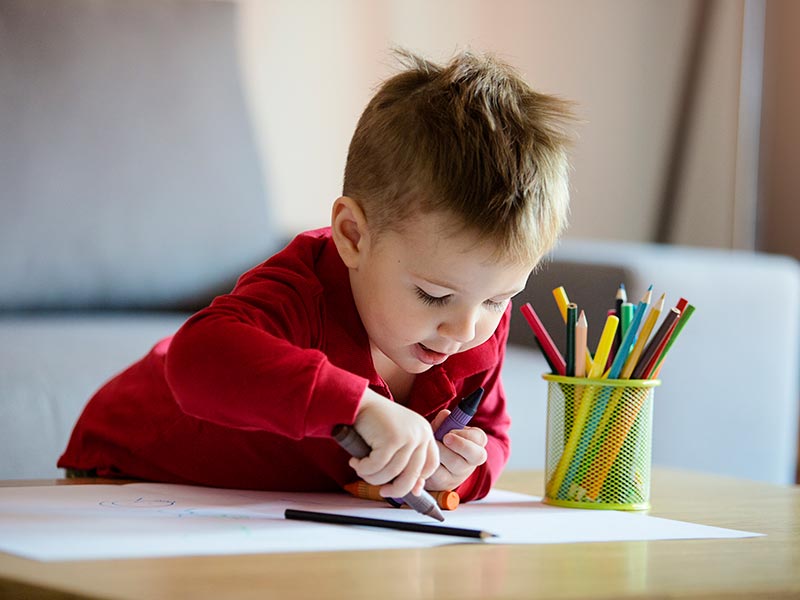 a happy child drawing