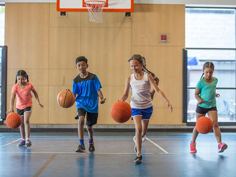 Children playing basketball