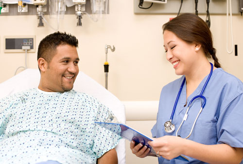 Patient and nurse in hospital