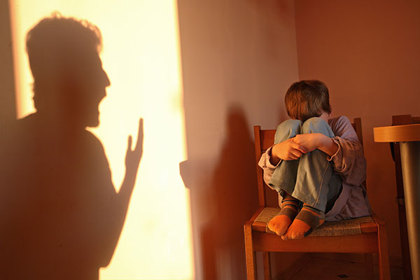 ACEs campaign - image of aggresive parent and frightened child