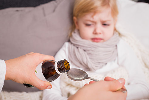 Child taking medication