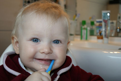 Child brushing teeth